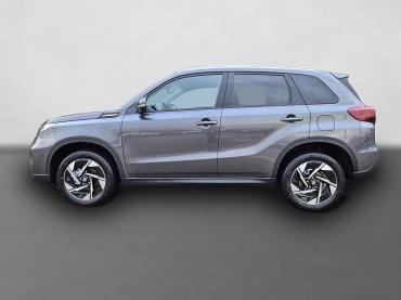 Fahrzeug ansehen: Suzuki Vitara Comfort+ 110PS Automatik MHEV 4x4 ALLGRIP 1.4 Boosterjet Allrad Teilleder Navi Klimaautomatik Sitzheizung ACC PDC v+h Rückf.Kamera Suzuki-Radio Apple CarPlay Android Auto Touchscreen 2xKeyless 17-LM Tageszulassung Suzuki Vitara Comfort+ 110PS Automatik MHEV 4x4 ALLGRIP 1.4 Boosterjet Allrad Teilleder Navi Klimaautomatik Sitzheizung ACC PDC v+h Rückf.Kamera Suzuki-Radio Apple CarPlay Android Auto Touchscreen 2xKeyless 17-LM Tageszulassung