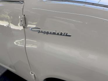Restauriertes Goggomobil-Coupé von hinten in der Pflegehalle von Autochampion24