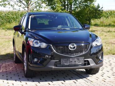 Schwarzer Mazda CX-5 mit glänzender Lackversiegelung durch Autochampion24 München