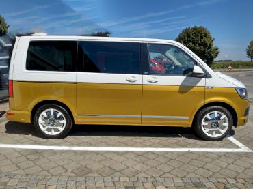 VW T6 Multivan zweifarbig Candy weiß Kurkumagelb metallic freie Werkstatt Autochampion24 Höhenkirchen